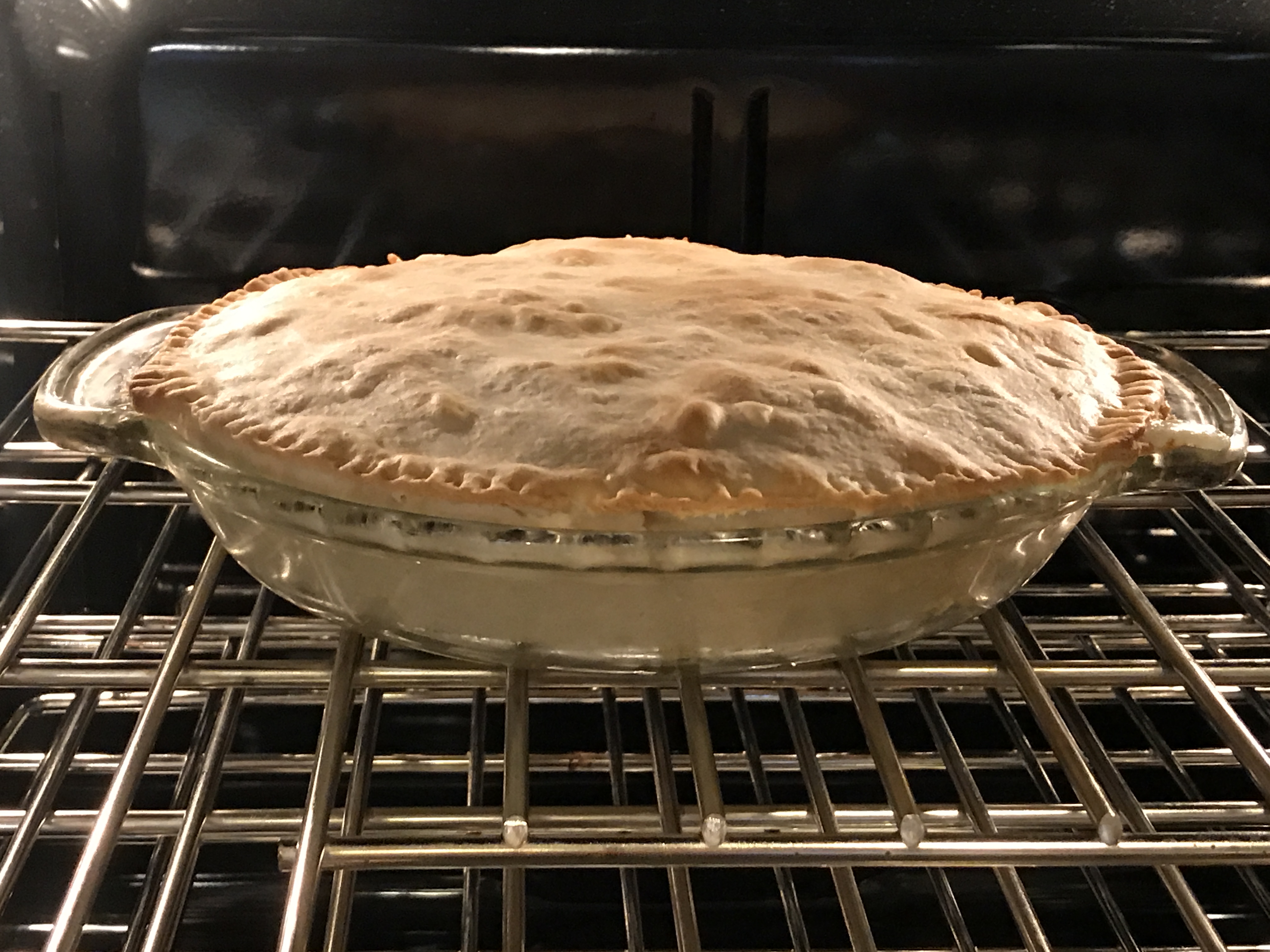 chicken pot pie baking in the oven