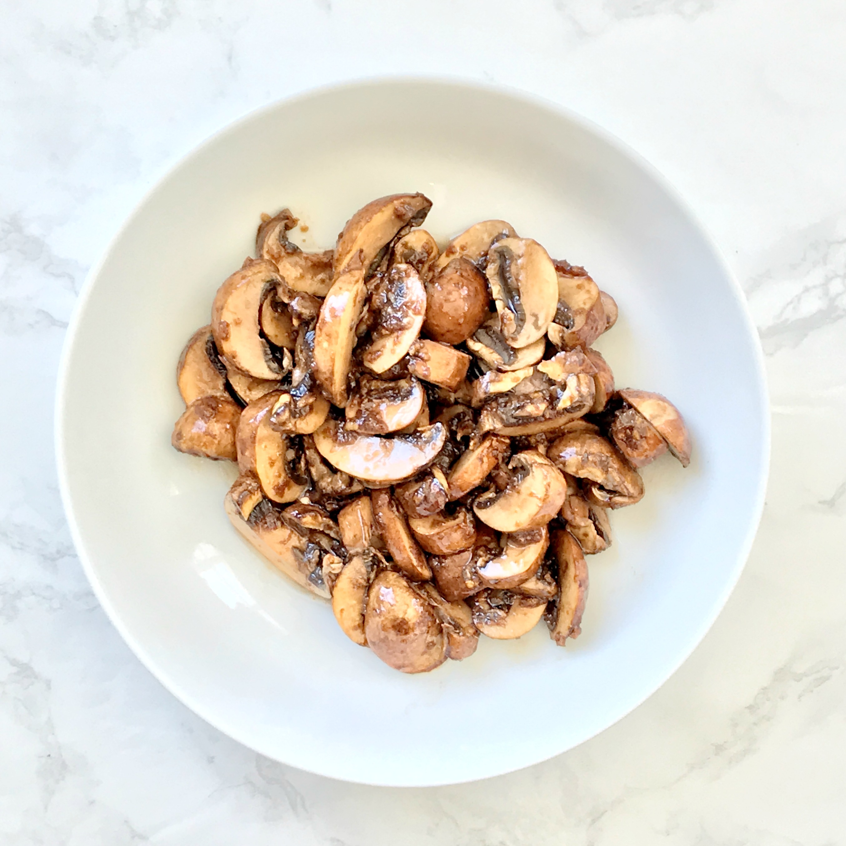 bowl of marinated mushrooms